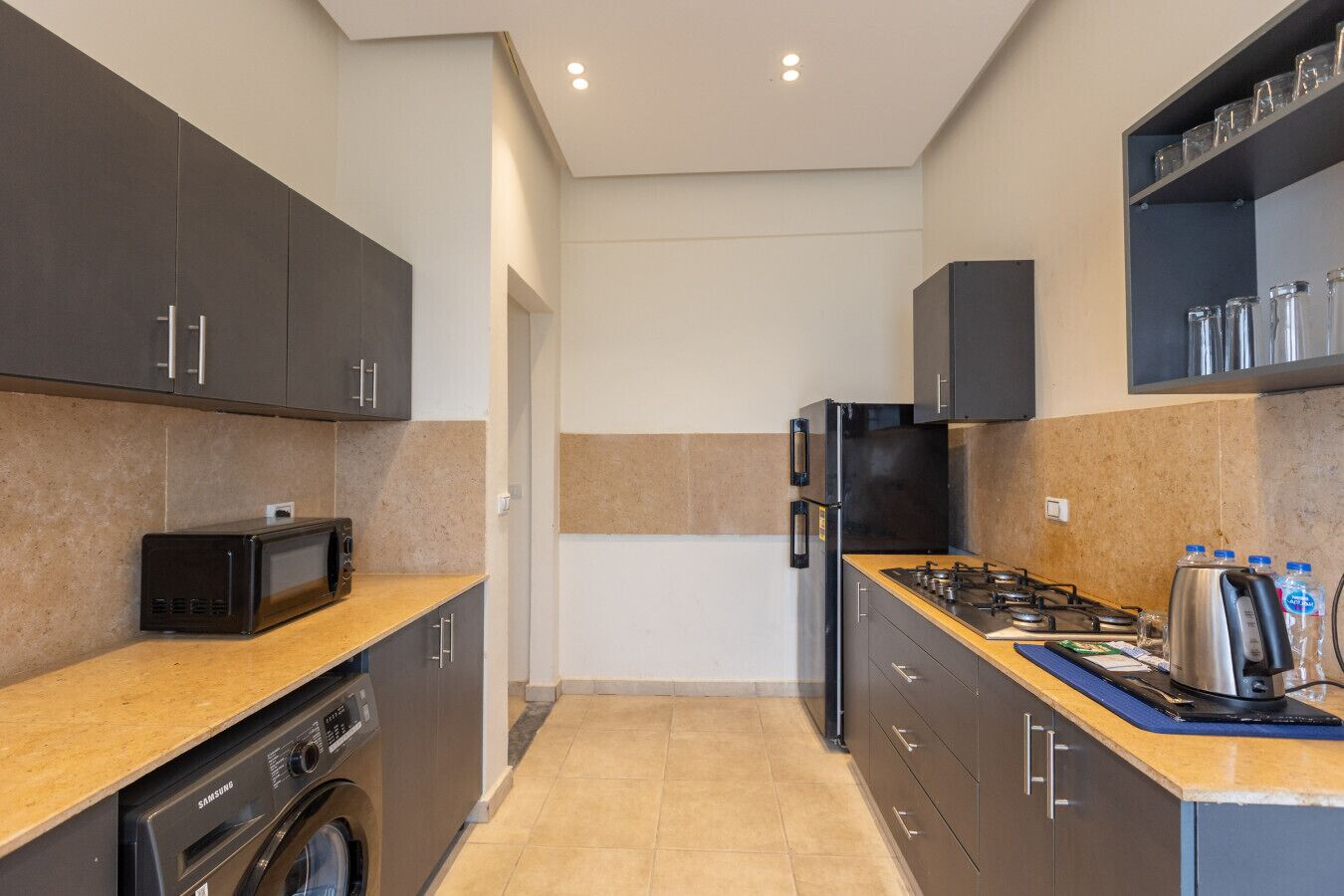 Fridge, microwave, stovetop, cookware/dishes/utensils