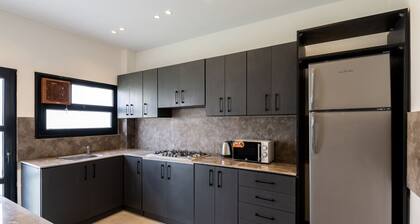 4BR Villa with Private Garden | 15 mins from airport | 10 Mins from shopping pool | premium service