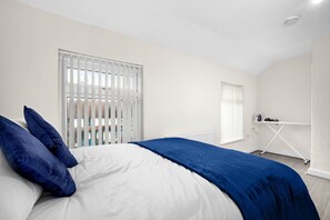 Casa | 3 habitaciones, tabla de planchar con plancha y wifi gratis 