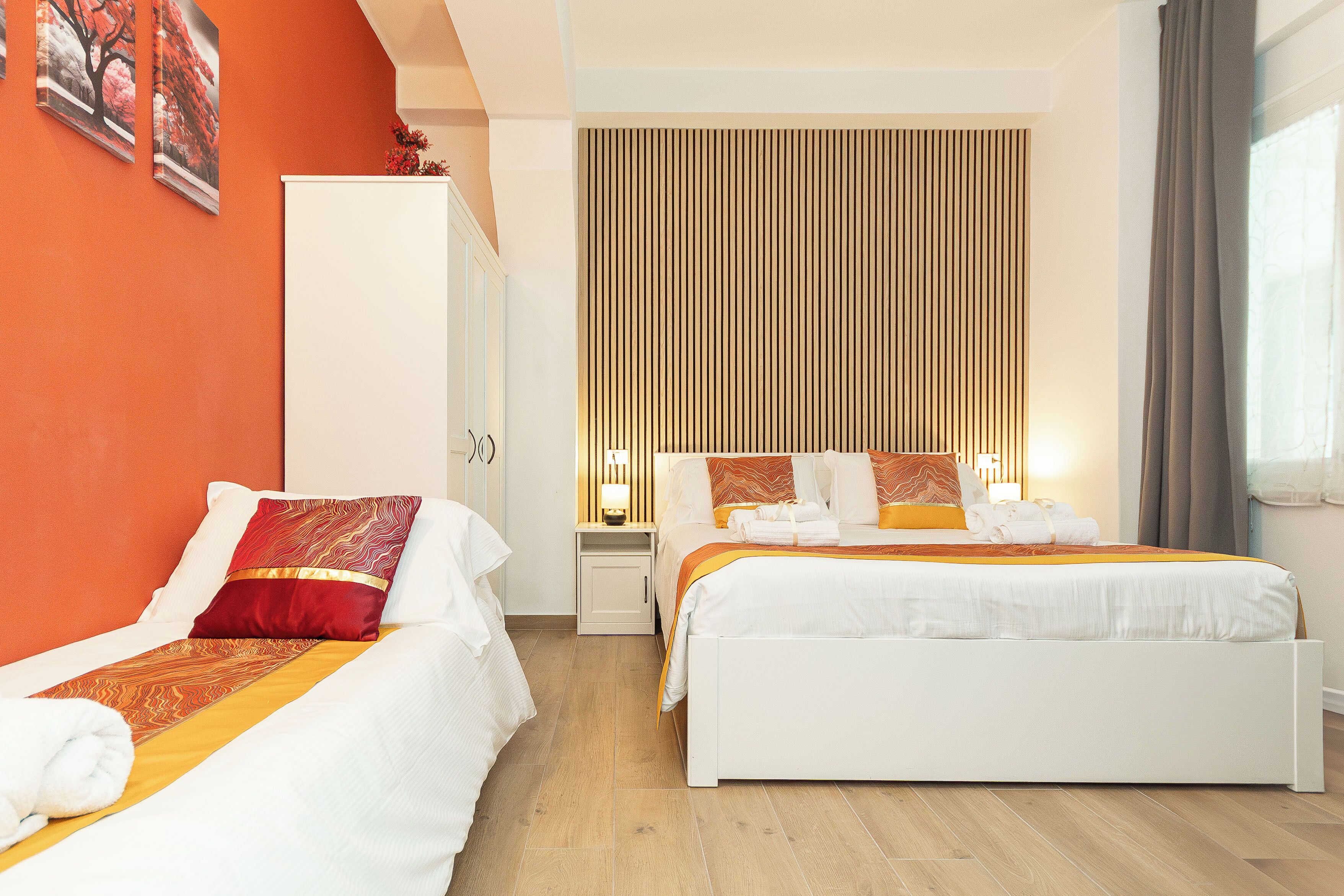 Deluxe-Dreibettzimmer | Schreibtisch, laptopgeeigneter Arbeitsplatz, kostenloses WLAN