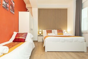 Habitación triple Deluxe | Escritorio, espacio para trabajar con un portátil, wifi gratis