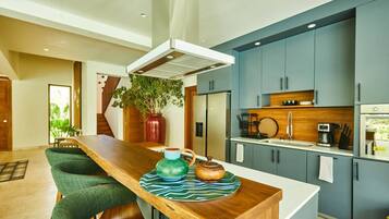 Family Villa, Beach View | Private kitchen | Coffee/tea maker, dining tables