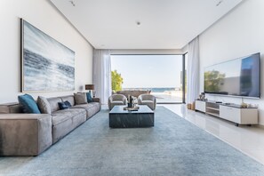 TV - Overlooking Pool & Sea Views Villa with BBQ Facility, Sharm - Al Dana Villa (Fujairah)