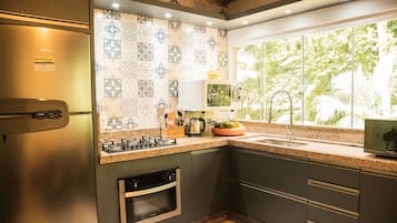 Family House | Private kitchen | Fridge, cookware/dishes/utensils, dining tables