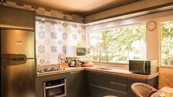 Family House | Private kitchen | Fridge, cookware/dishes/utensils, dining tables