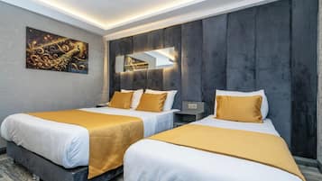 Habitación clásica con 2 camas individuales | Ropa de cama de alta calidad y caja de seguridad en la habitación