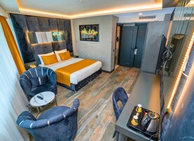 Deluxe szoba | Prémium ágynemű, széf a szobában és hangszigetelés