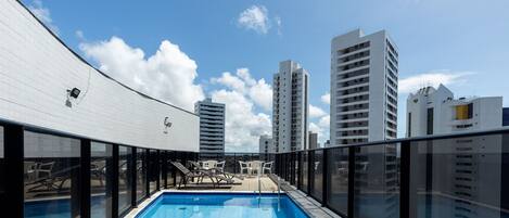 Outdoor pool, pool umbrellas, pool loungers