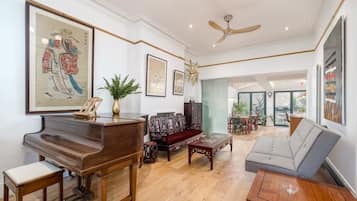 Luxury Apartment, City View | Living area | 27-inch LCD TV with digital channels
