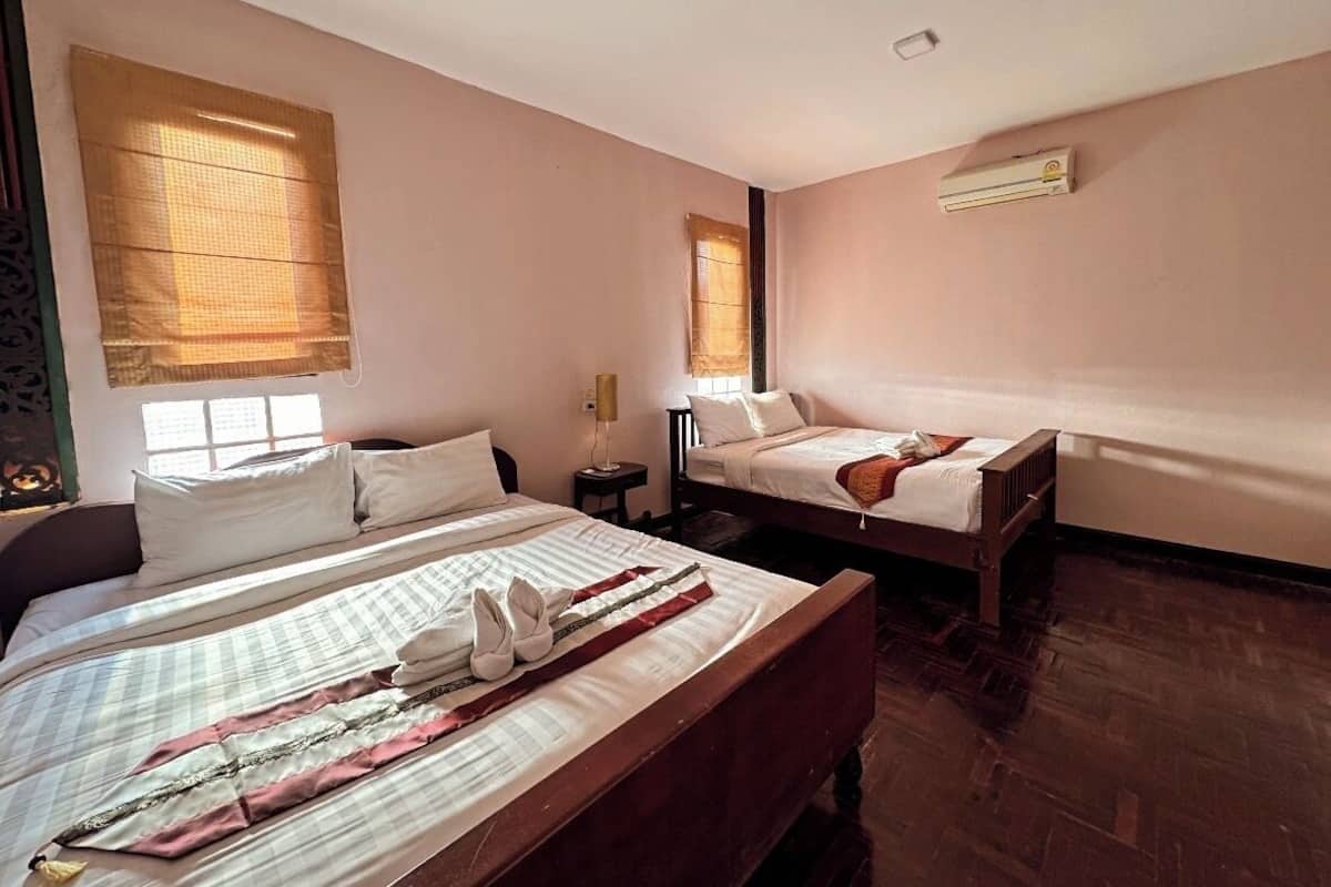 Habitación familiar, 1 habitación, para no fumadores, vista a la alberca | Wifi gratis y ropa de cama