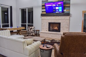 Smart TV, fireplace, books