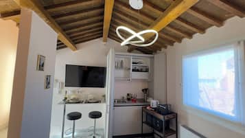 Fridge, coffee/tea maker, toaster, cookware/dishes/utensils