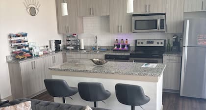Spacious apartment with a baseball field view also pool view