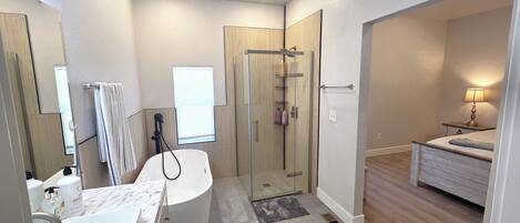 Shower, hair dryer, towels, soap