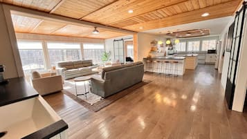 Smart TV, fireplace, foosball, books