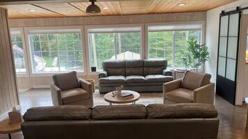 Smart TV, fireplace, table football, books