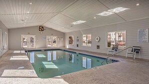 An indoor swimming pool with clear water, tiled walls, and a ceiling with recessed lighting. - Carolina Dreamin - ocean, sandy beaches, restaurants, music and golfing (Myrtle Beach)
