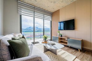 Apartamento | Área de estar | Smart TV
