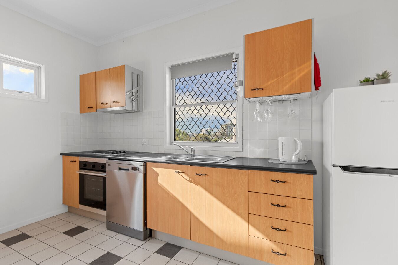 Fridge, stovetop, coffee/tea maker, toaster