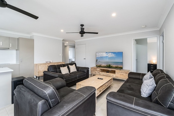 Enjoy open-plan living with modern furnishings