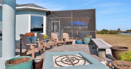 Sprawling intercoastal home with boat lifts, pool and hot tub