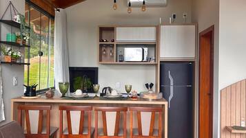 Deluxe Chalet, Jetted Tub, Mountain View | Private kitchen | Dining tables