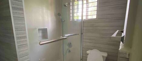 Shower, hair dryer, towels, soap