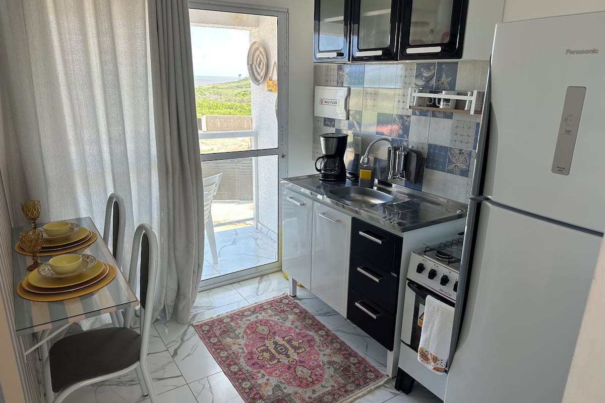 Fridge, oven, cookware/dishes/utensils