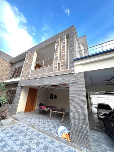 Charming 2-bedroom bungalow with WiFi and AC in lovely Sukkur plus Swimming Pool