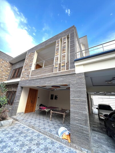 Charming 2-bedroom bungalow with WiFi and AC in lovely Sukkur plus Swimming Pool