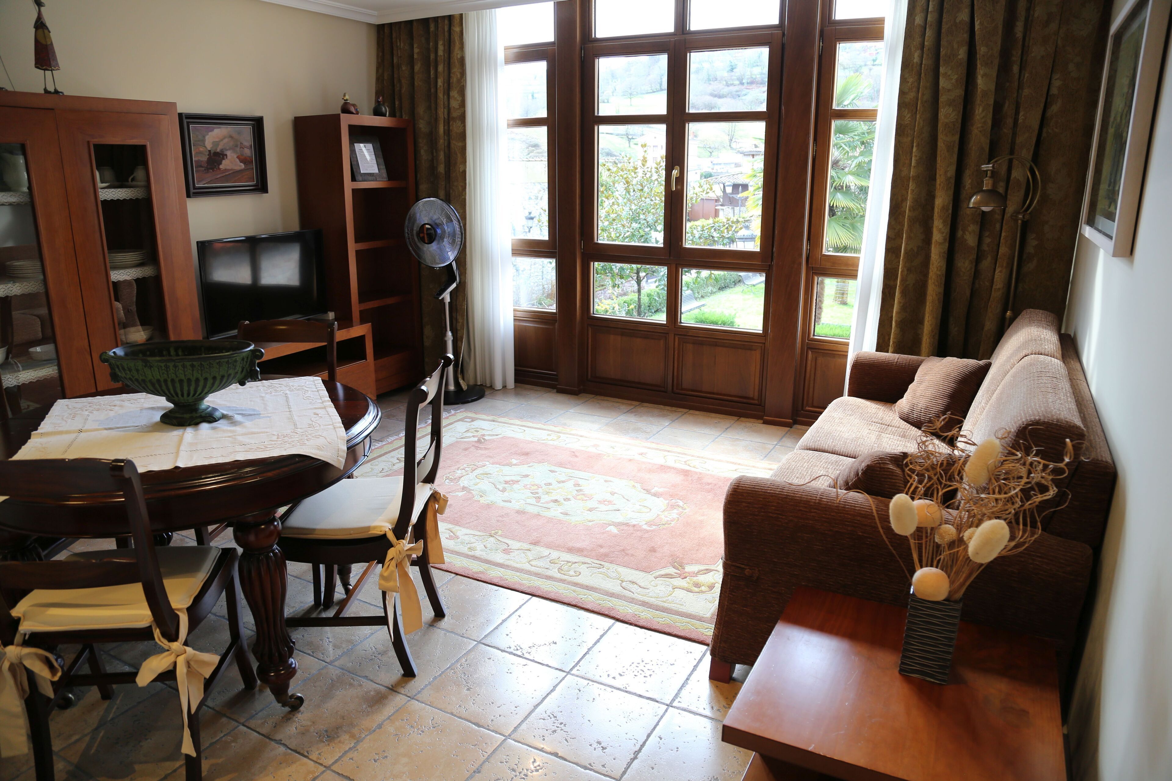 Deluxe Apartment | Living area | TV