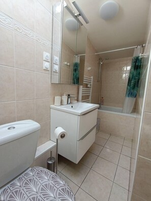 Hair dryer, towels, soap, shampoo