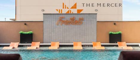 Outdoor pool, open 8:00 AM to 10:00 PM, pool umbrellas, sun loungers