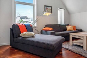 Apartamento, 2 quartos | Área de estar