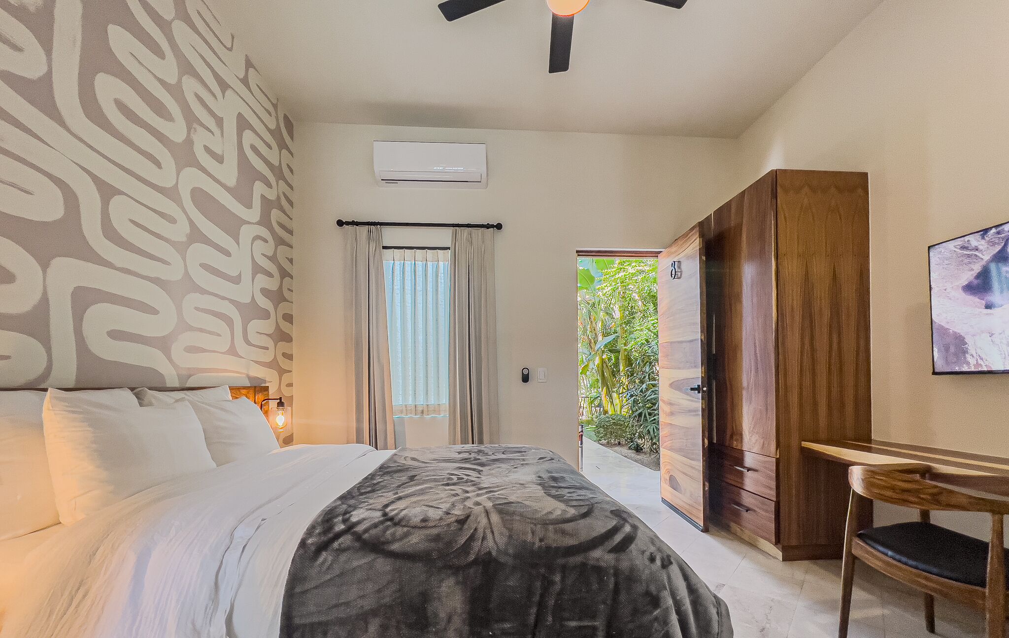 Queen Standard Suite 8 | Desk, laptop workspace, blackout drapes, soundproofing