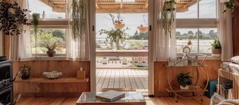 Luxury eco-design waterfront fishing Batch with guests' vegetable garden.