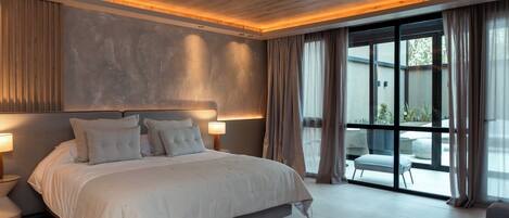 Deluxe Suite, 1 King Bed with Sofa bed, Courtyard View, Ground Floor | 1 bedroom, free minibar, in-room safe, laptop workspace