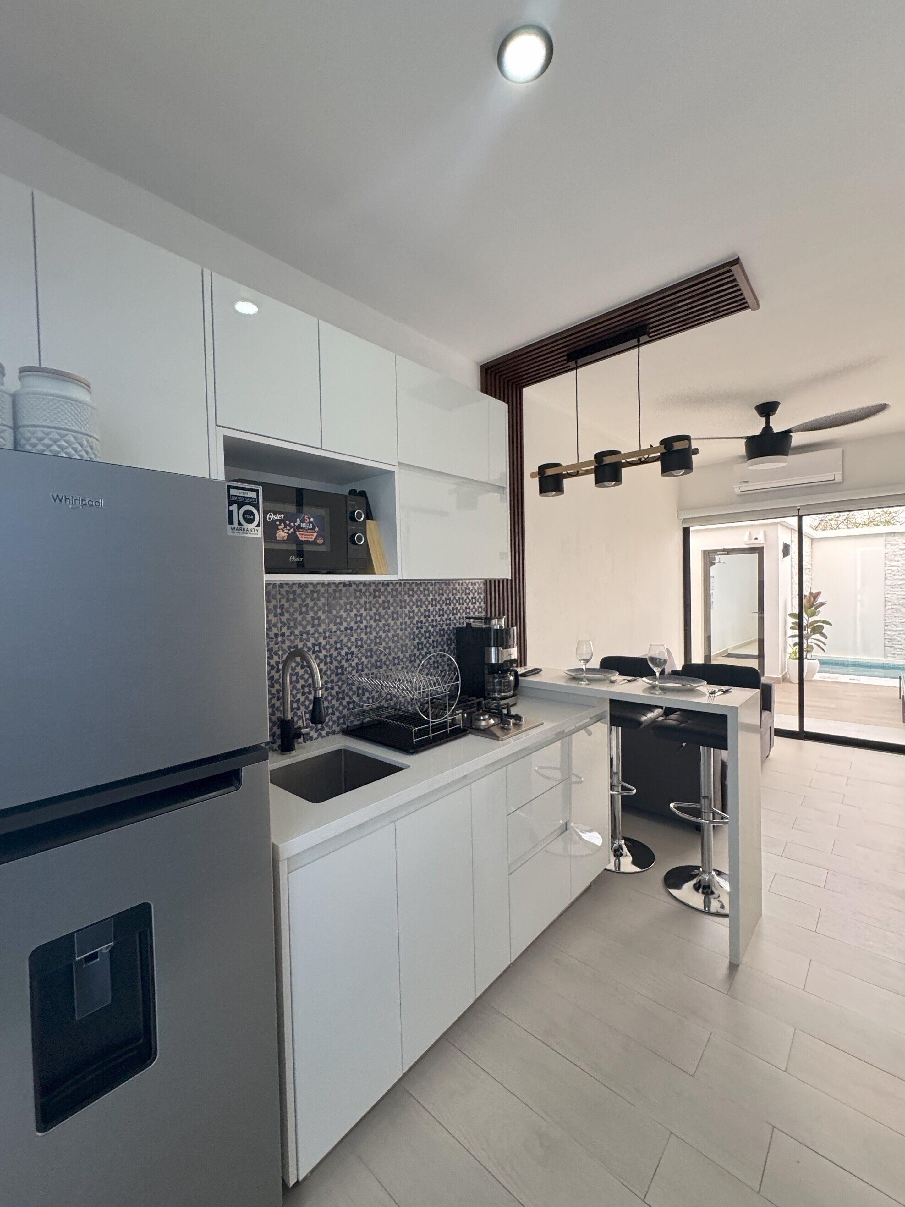 Fridge, microwave, coffee/tea maker, toaster