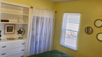2 bedrooms, desk, iron/ironing board, travel crib