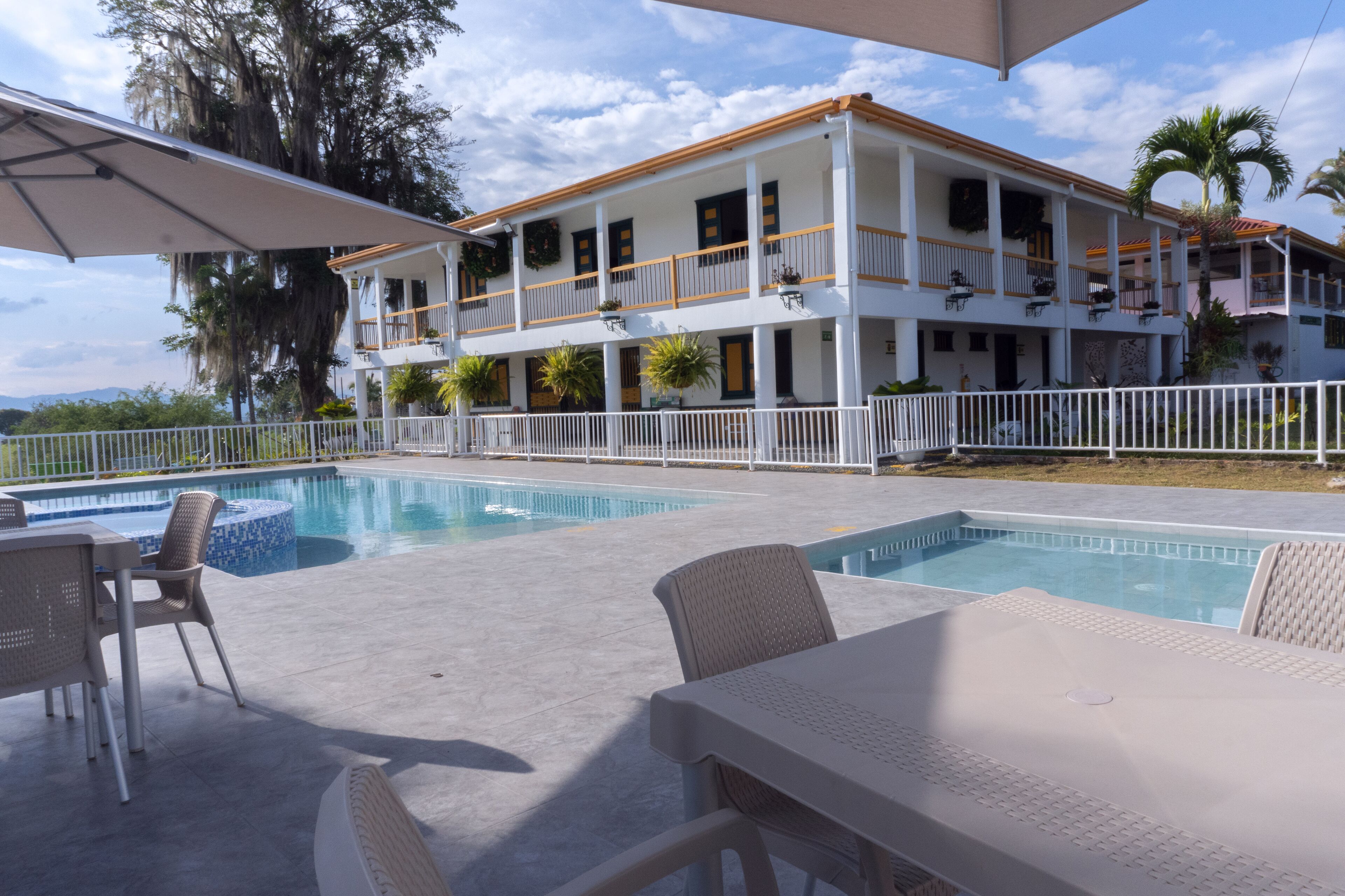 2 outdoor pools, open 9:00 AM to 9:00 PM, free cabanas, pool umbrellas