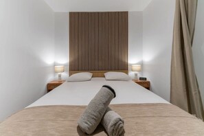 1 slaapkamer, een strijkplank/strijkijzer, reisbedje, wifi