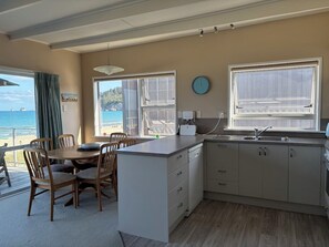 Microwave, oven, stovetop, dishwasher - Hosts on the Coast  Paradise on Pipi (Whangamata)