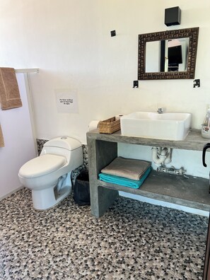 Shower, hair dryer, towels, soap