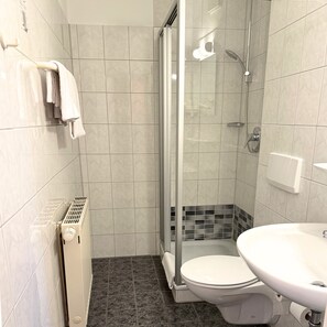 Shower, towels, soap, shampoo