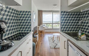 Fridge, stovetop, coffee/tea maker