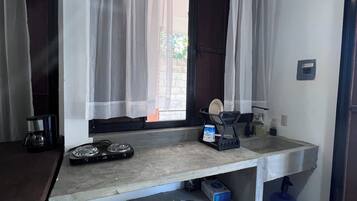 Fridge, microwave, stovetop, coffee/tea maker