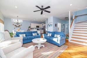 Smart TV, fireplace, books, printers