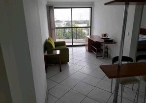 Appartement, véranda, vue ville | Coin séjour