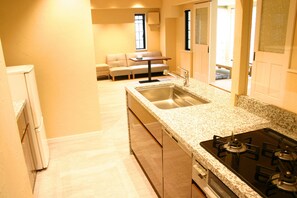 Room 101, Non Smoking | Private kitchenette | Fridge, microwave, stovetop, cookware/dishes/utensils