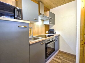 Fridge, microwave, cookware/dishes/utensils
